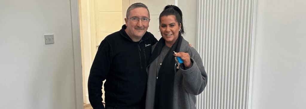 Dr. Lauren with landlord, Derek, in front of her new clinic at Haddow Business Centre in Hamilton.
