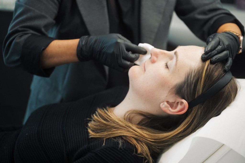 Dr Lauren prepping a patient's face for Botox.
