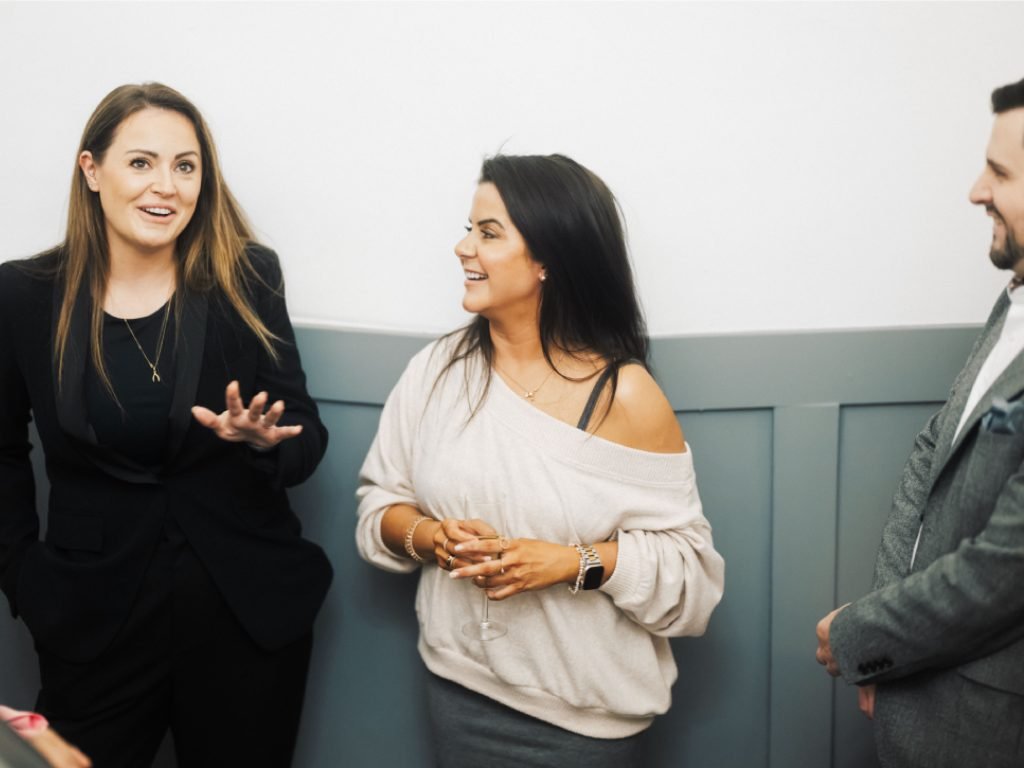 Dr Lauren addressing a group of people at her clinic launch party in Haddow Street, Hamilton.