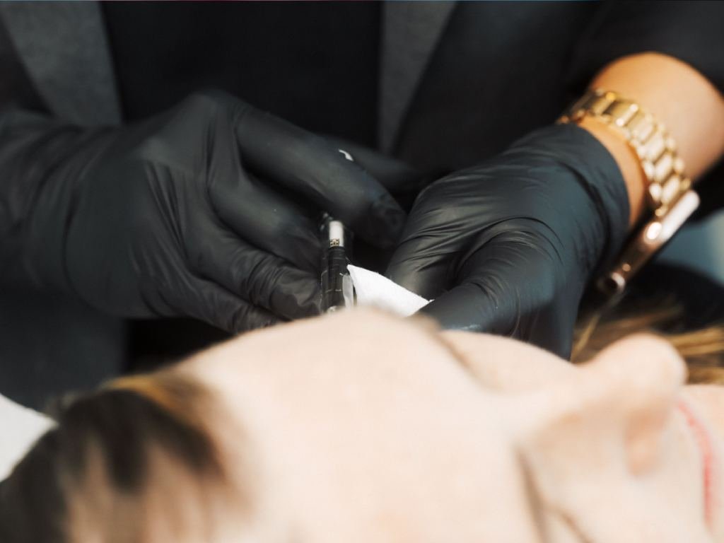 Dr. Lauren injecting Profhilo in a patient's cheek area.