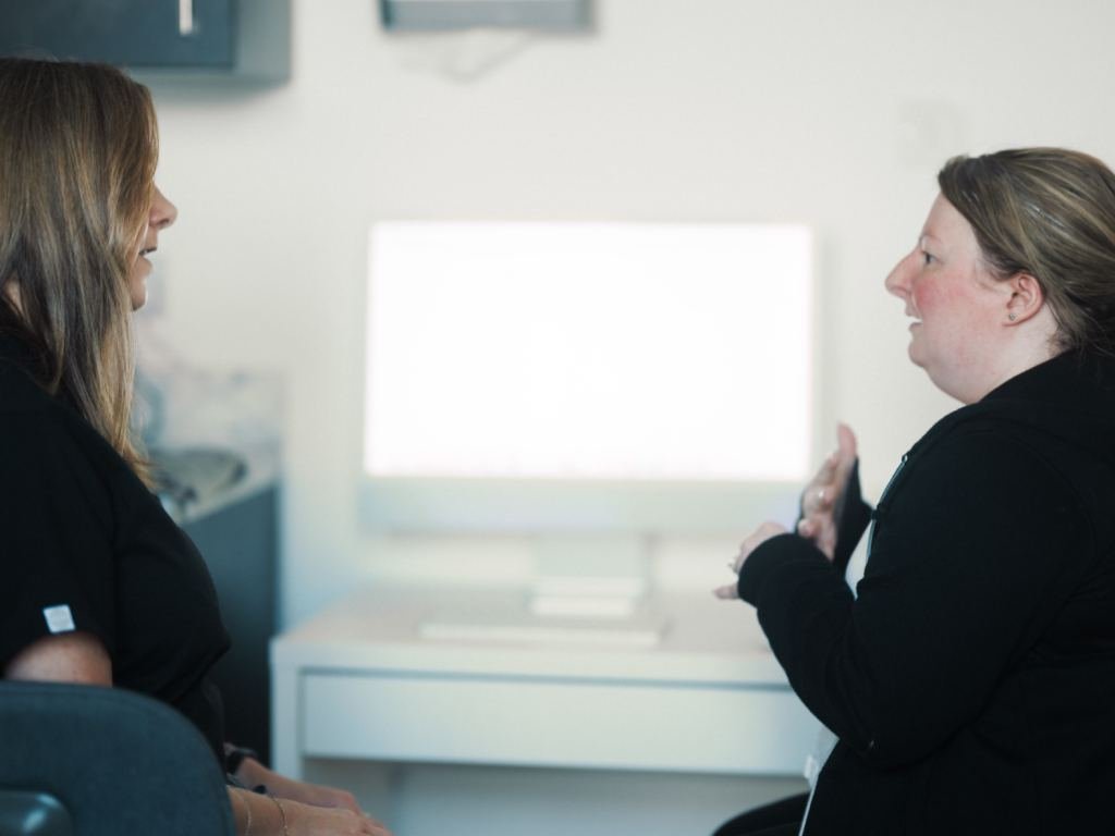 Skin Therapist, Lynn consulting a patient for rosacea treatment.