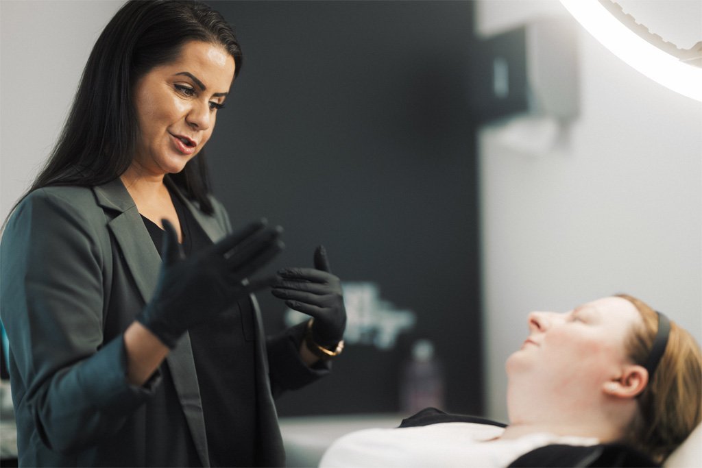 Dr Lauren consulting a patient about which anti-wrinkle treatment will suit her the most.
